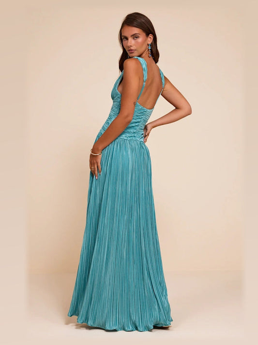 Turquoise A-line maxi chiffon dress, angled back view with halter straps and flowing pleats