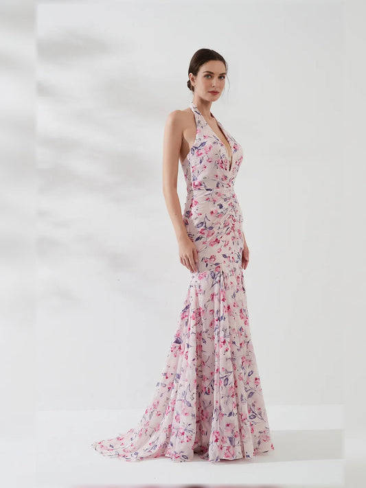 Floral halter neck formal dress with ruched bodice and tiered floor-length skirt
