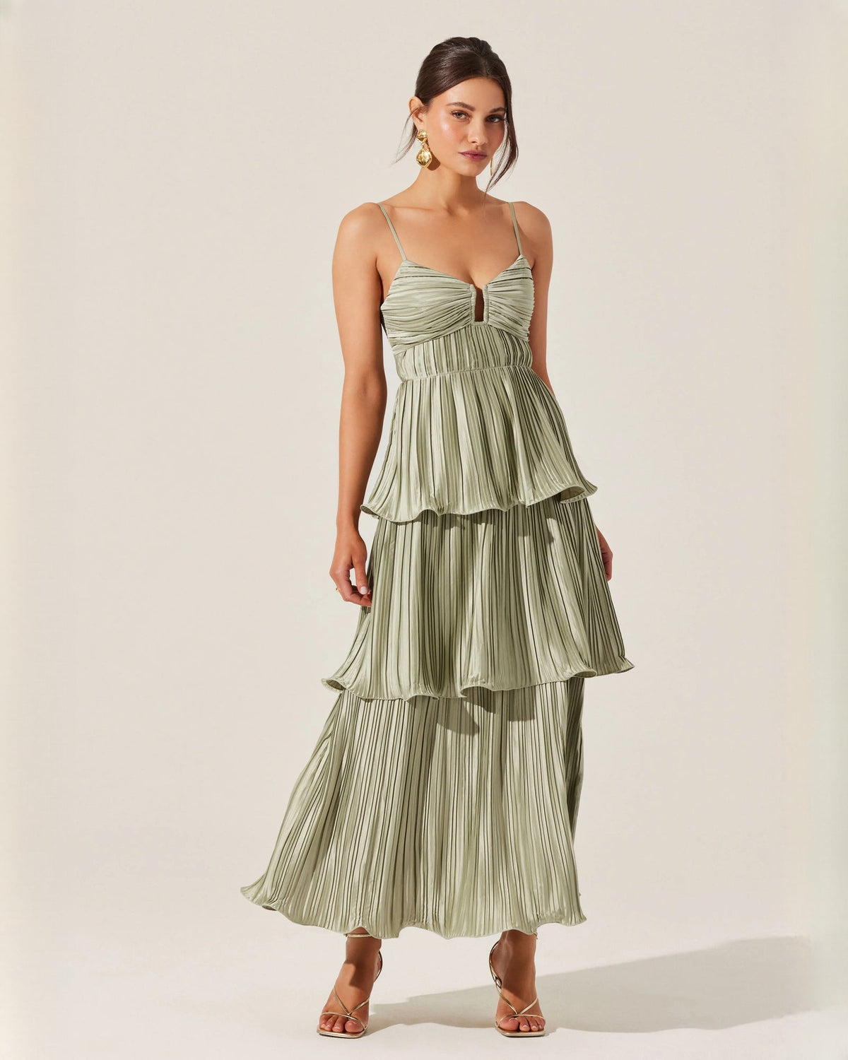 Sage green sleeveless tiered A-line maxi dress with V-neck and layered ruffle tiers