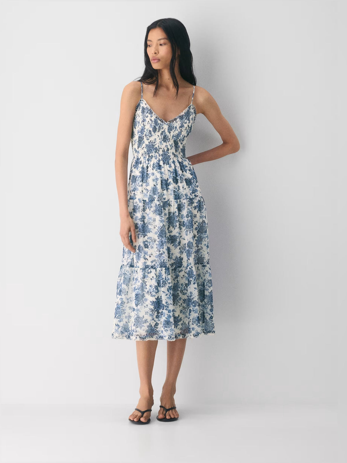 Floral print V-neck tiered midi dress with spaghetti straps and tiered skirt