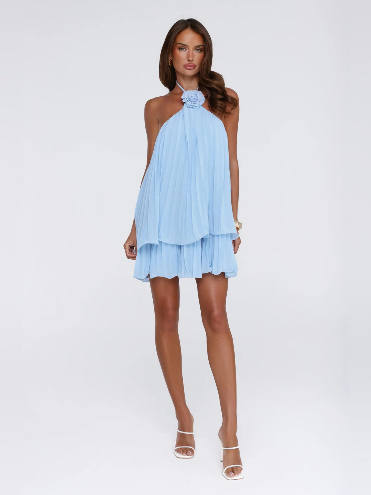 Light blue pleated halter neck mini dress with rosette and layered hem