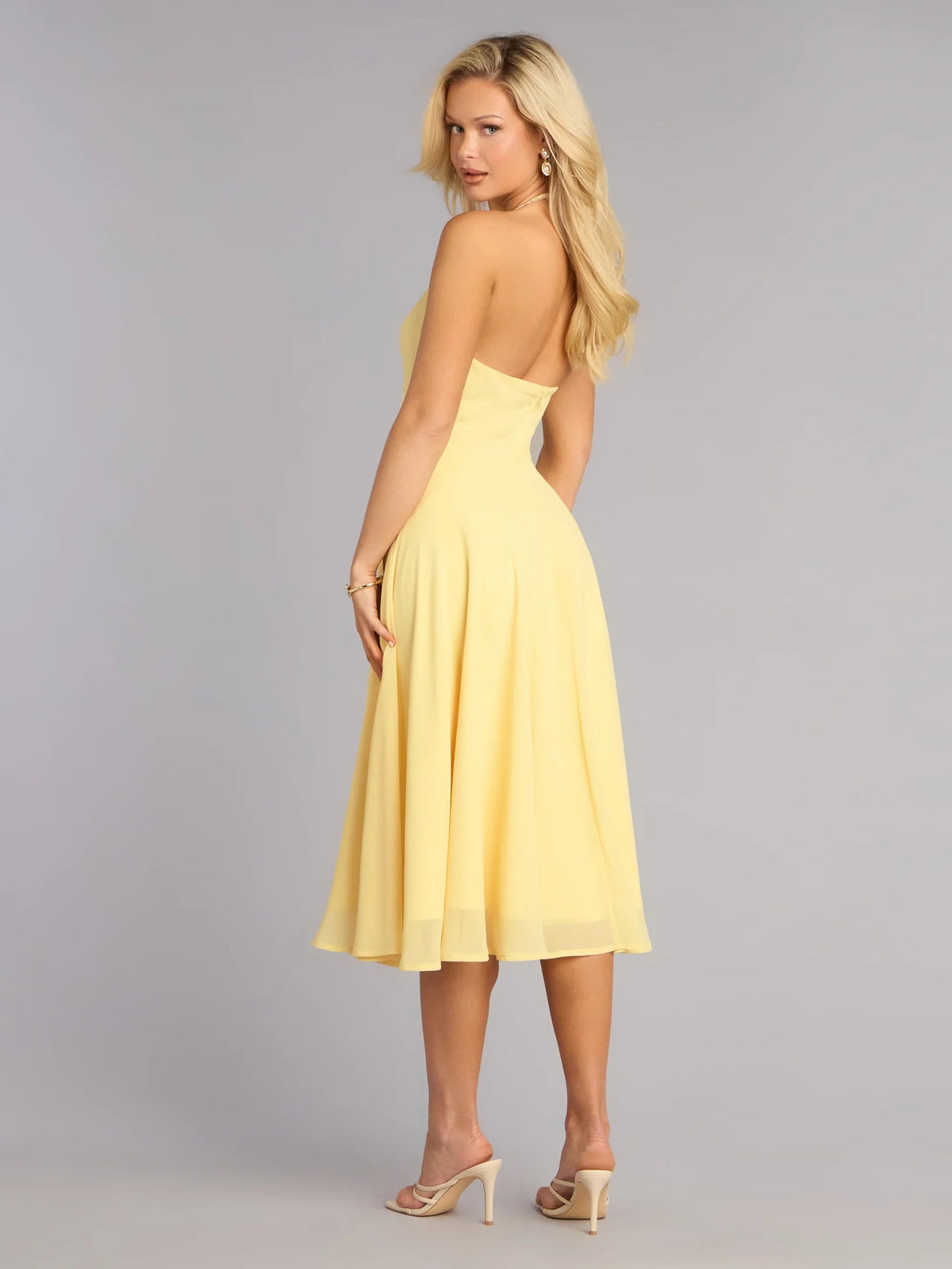 Yellow chiffon midi formal dress with V-neck halter, pleated skirt, and midi length