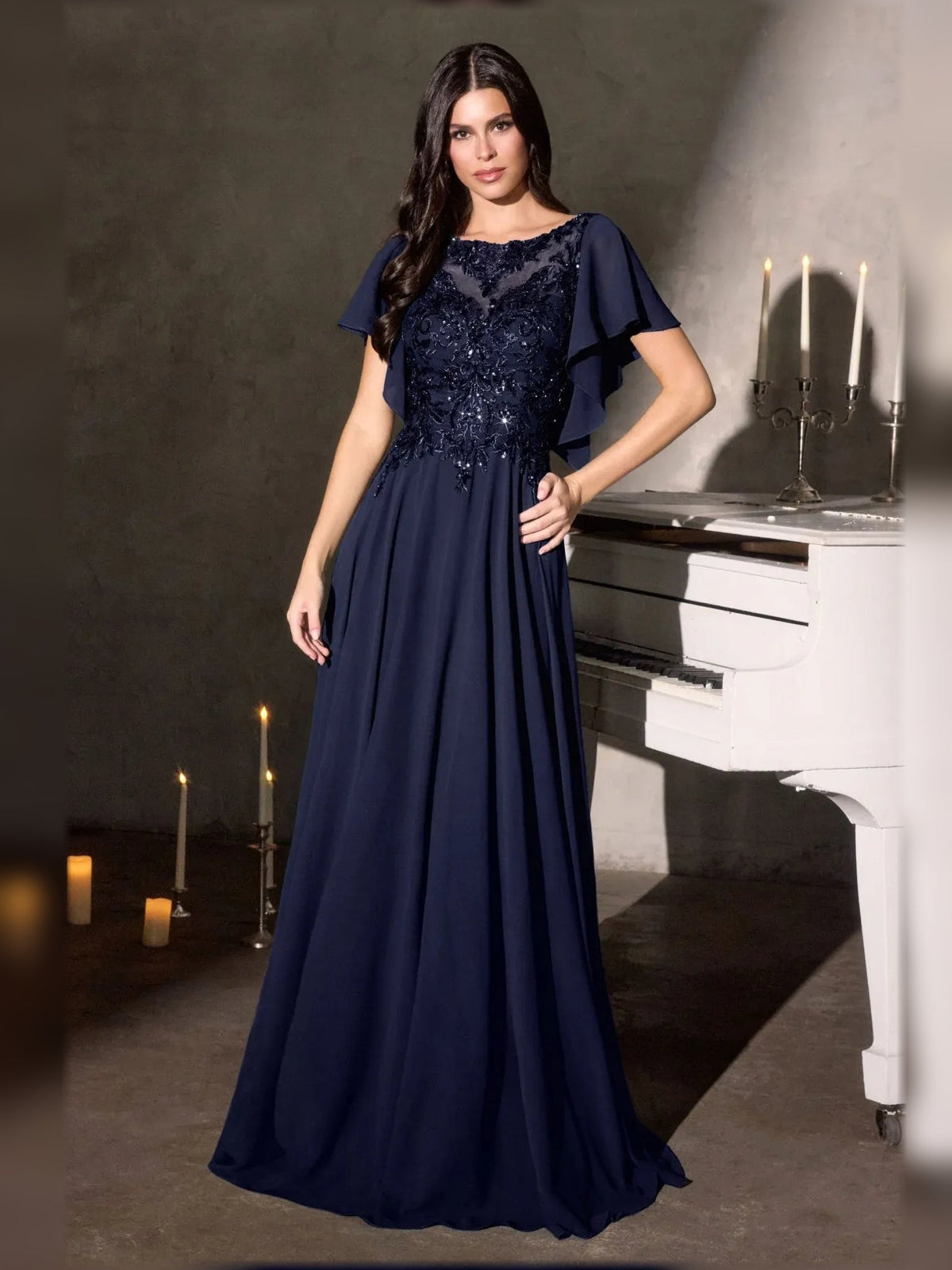 Navy blue chiffon A-line gown with beaded bodice and flutter sleeve cape detail