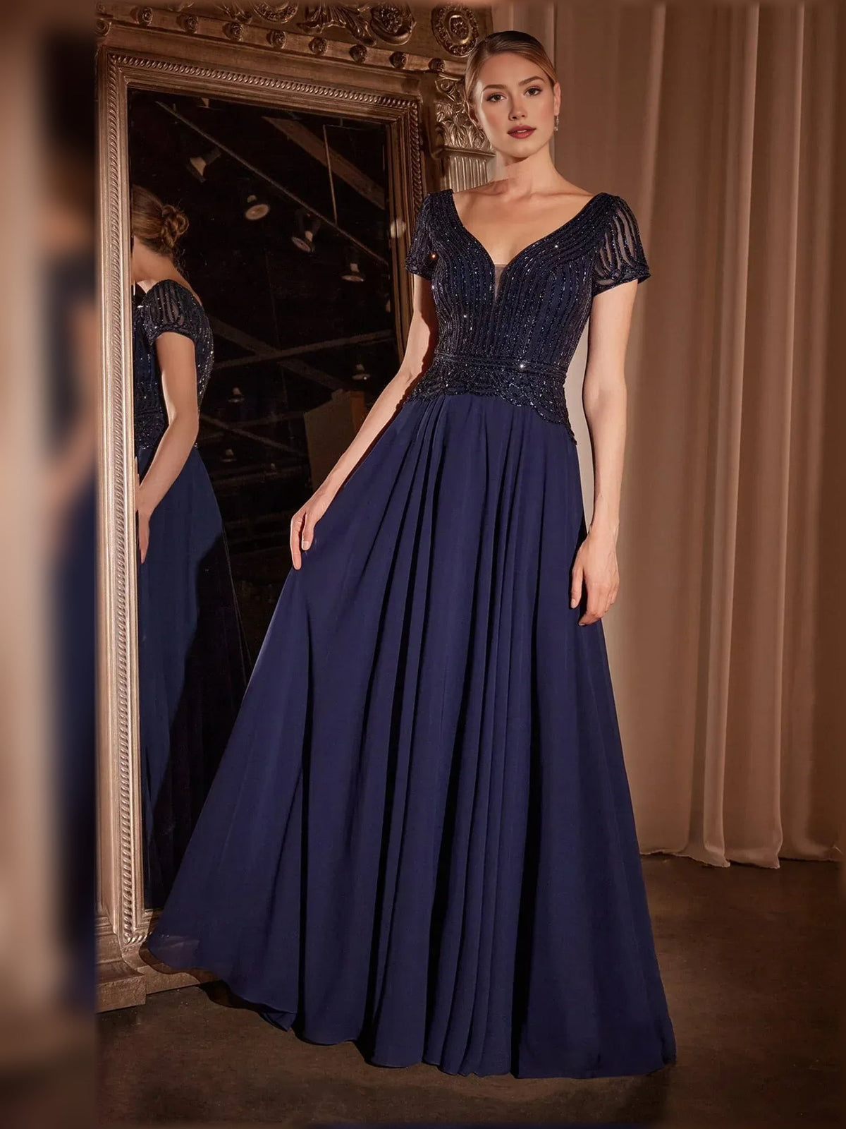 Navy V-neck A-line chiffon dress with beaded neckline and flowing pleated skirt