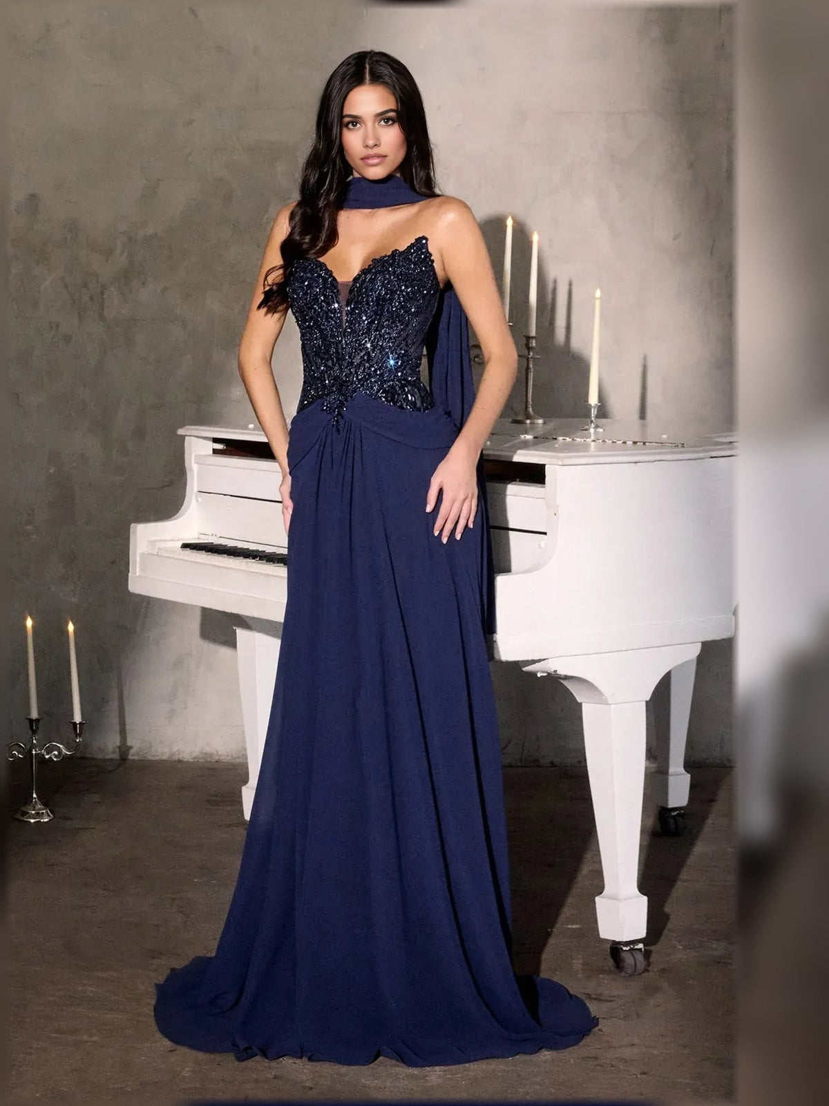Navy strapless A-line chiffon gown with beaded bodice and floor-length drape skirt