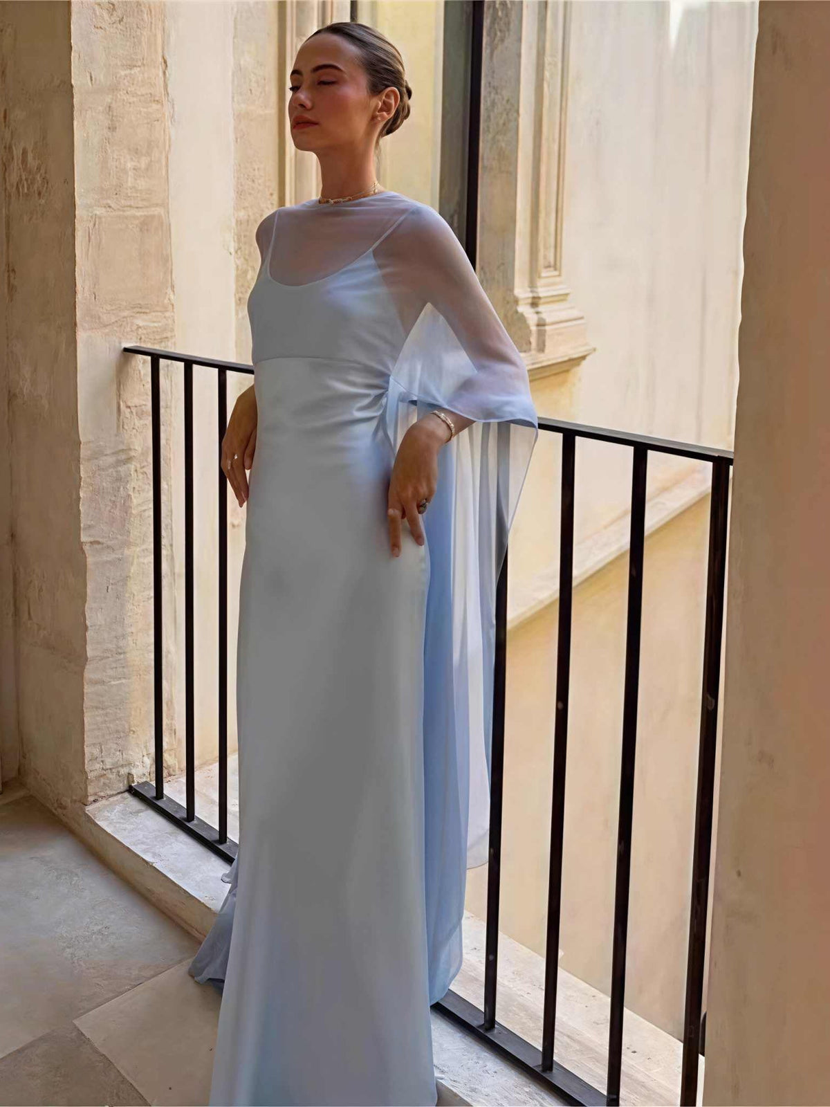 Steel blue satin A-line maxi dress with draped back overlay and long hem