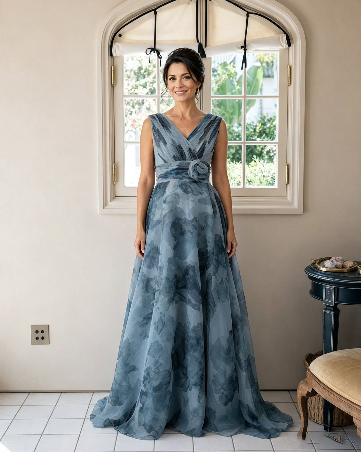 Dusty blue floral chiffon mother-of-the-bride dress, V-neck with rosette sash, sleeveless full skirt