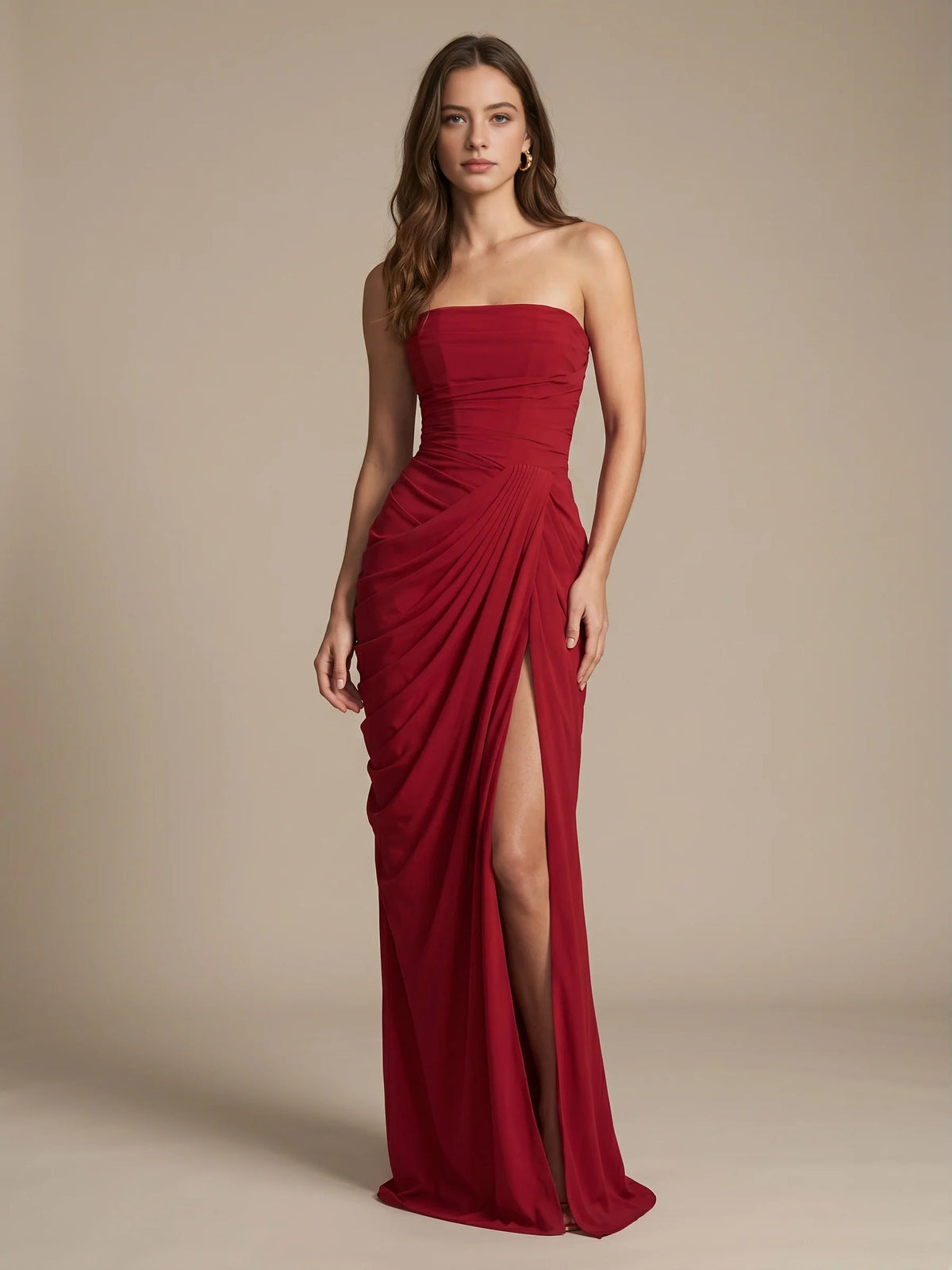 Deep red strapless mermaid maxi dress with ruched draped bodice and front slit