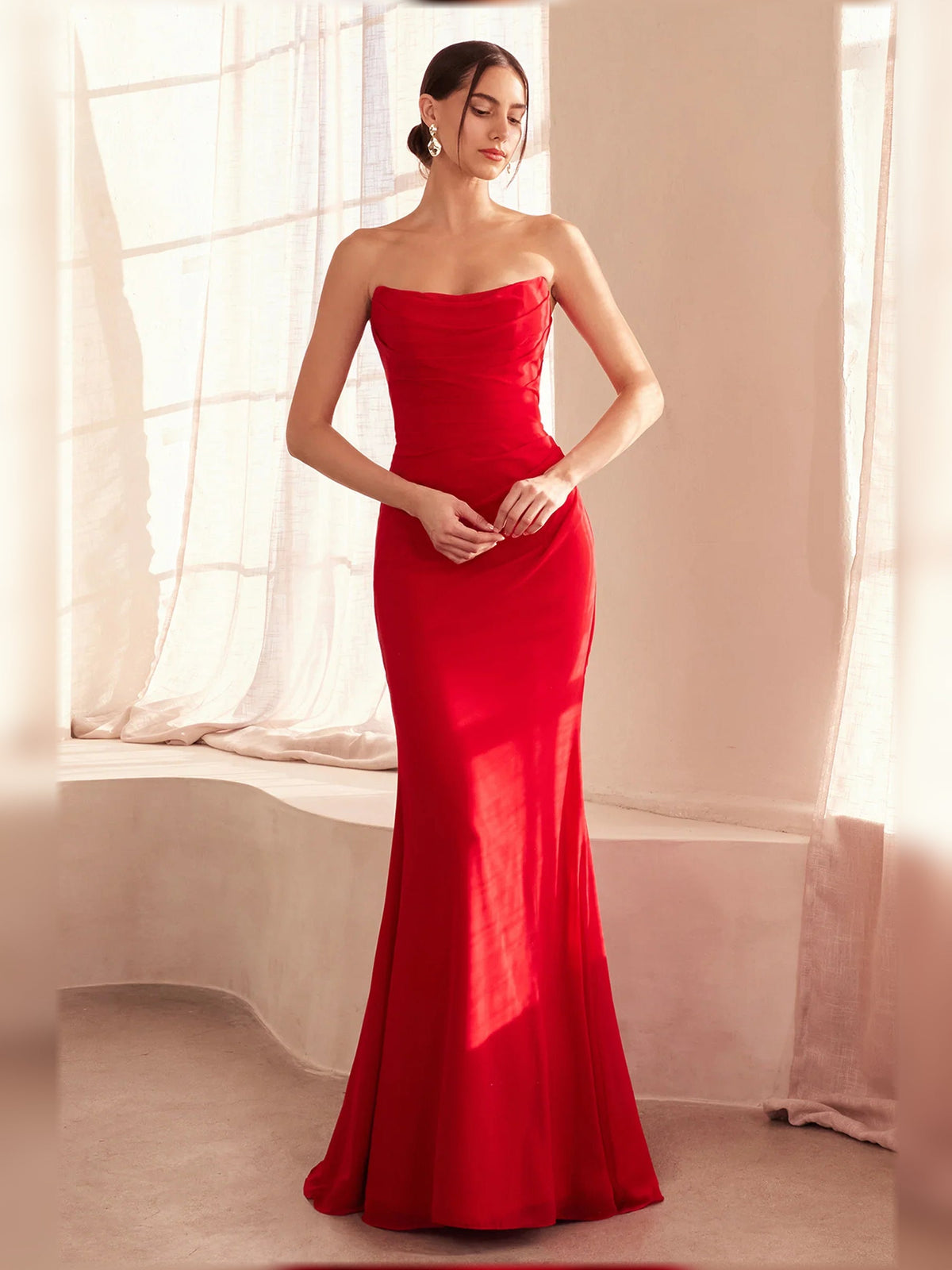 Strapless ruched floor-length formal dress in red with sleek draped bodice