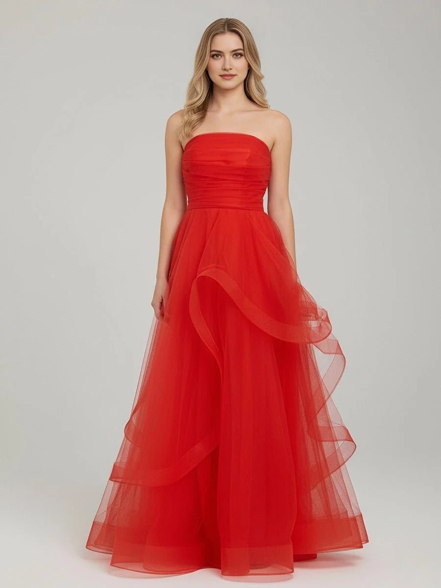 Red strapless tulle ball gown with ruched corset bodice and layered ruffle skirt