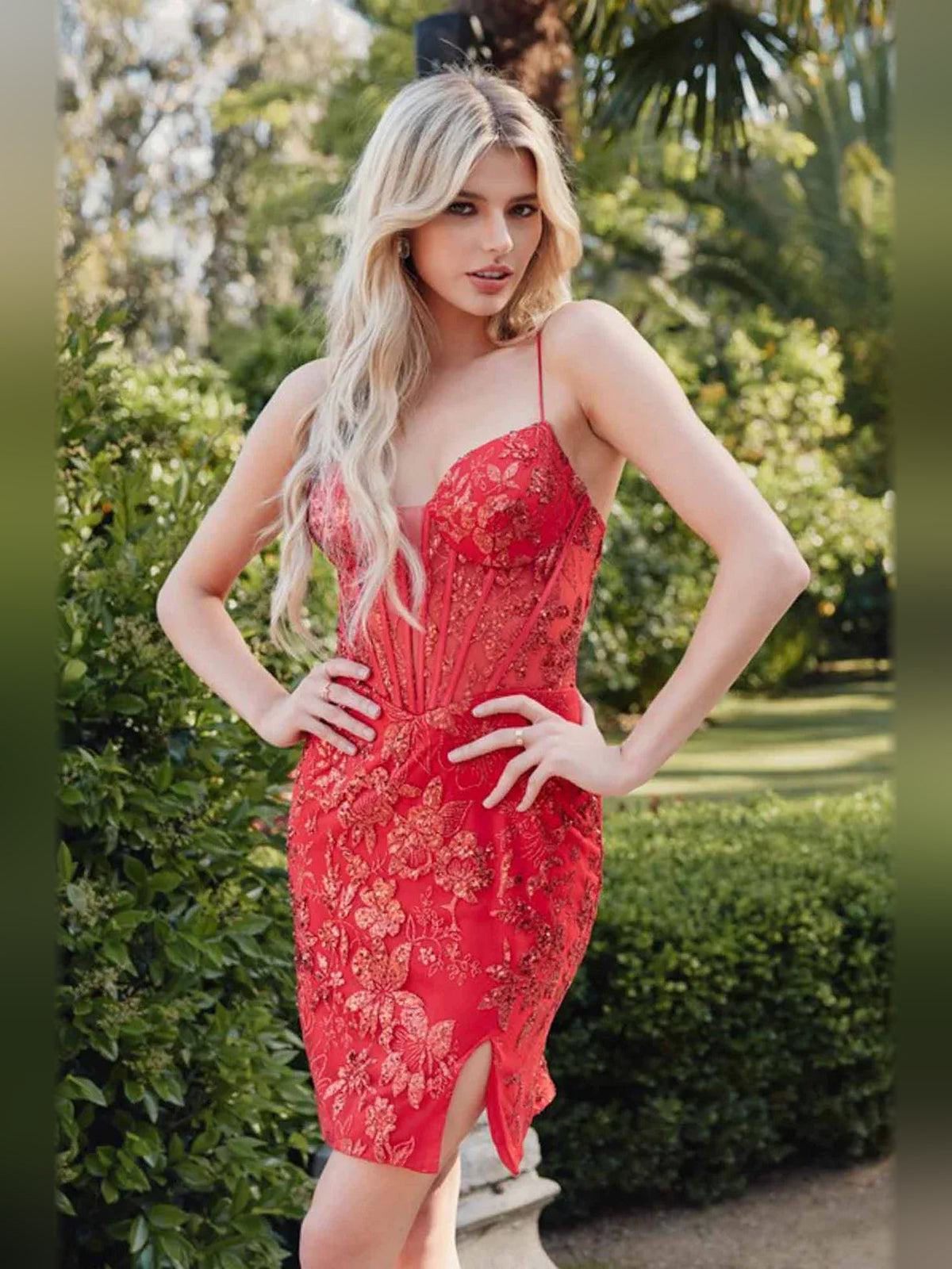 Red sequin corset mini dress with sweetheart neckline and front slit
