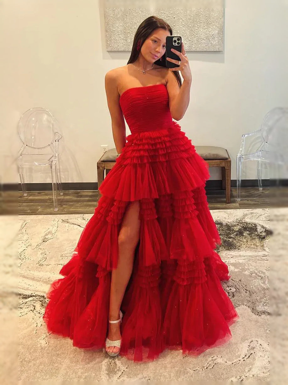 Red strapless tulle ball-gown prom dress with tiered ruffles and thigh slit