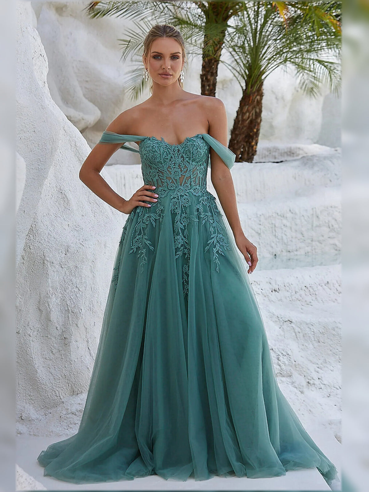 Teal off-shoulder maxi dress with short sleeves, floral bodice and flowing skirt