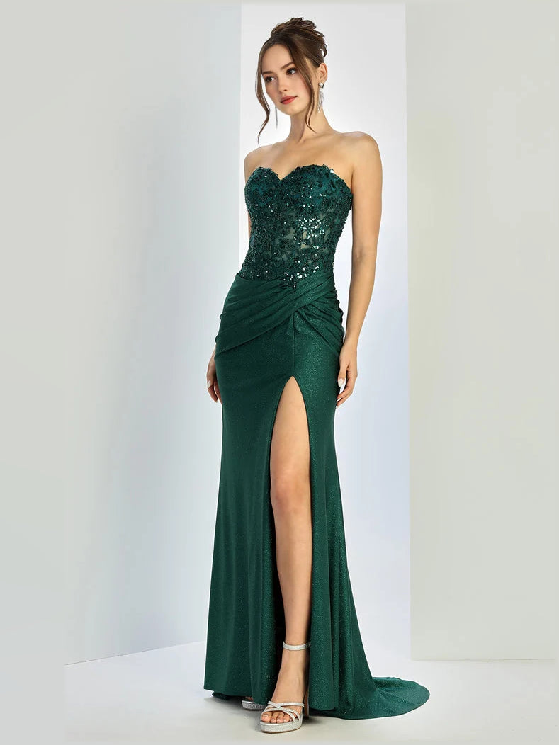 Emerald green strapless mermaid prom dress with beaded bodice and thigh-high slit