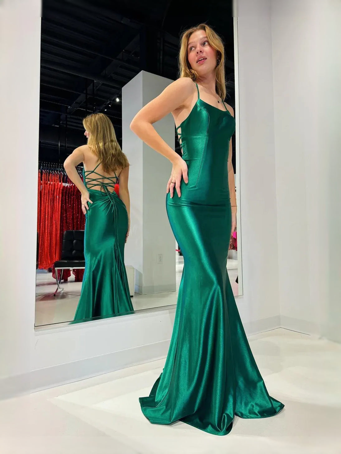 Emerald green satin mermaid prom dress with square neckline and draped skirt