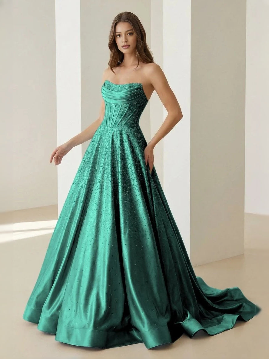 Emerald green strapless corset ballgown with draped bodice and full floor-length skirt