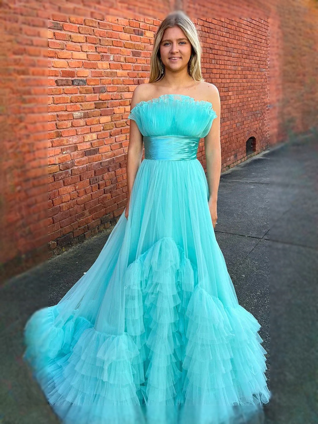 Light blue strapless sweetheart A-line tulle prom dress with ruched bodice and ruffled tiered skirt
