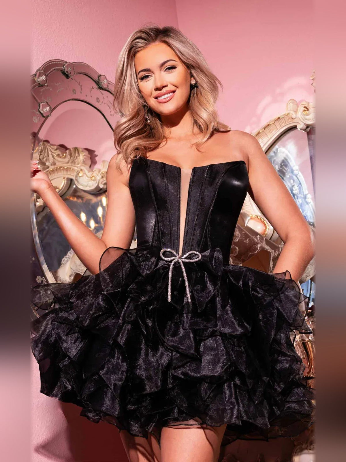 Black strapless sweetheart corset dress with layered ruffled A-line short skirt