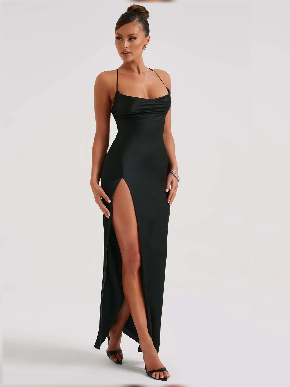 Black square-neck formal dress with high side slit, floor-length fitted silhouette