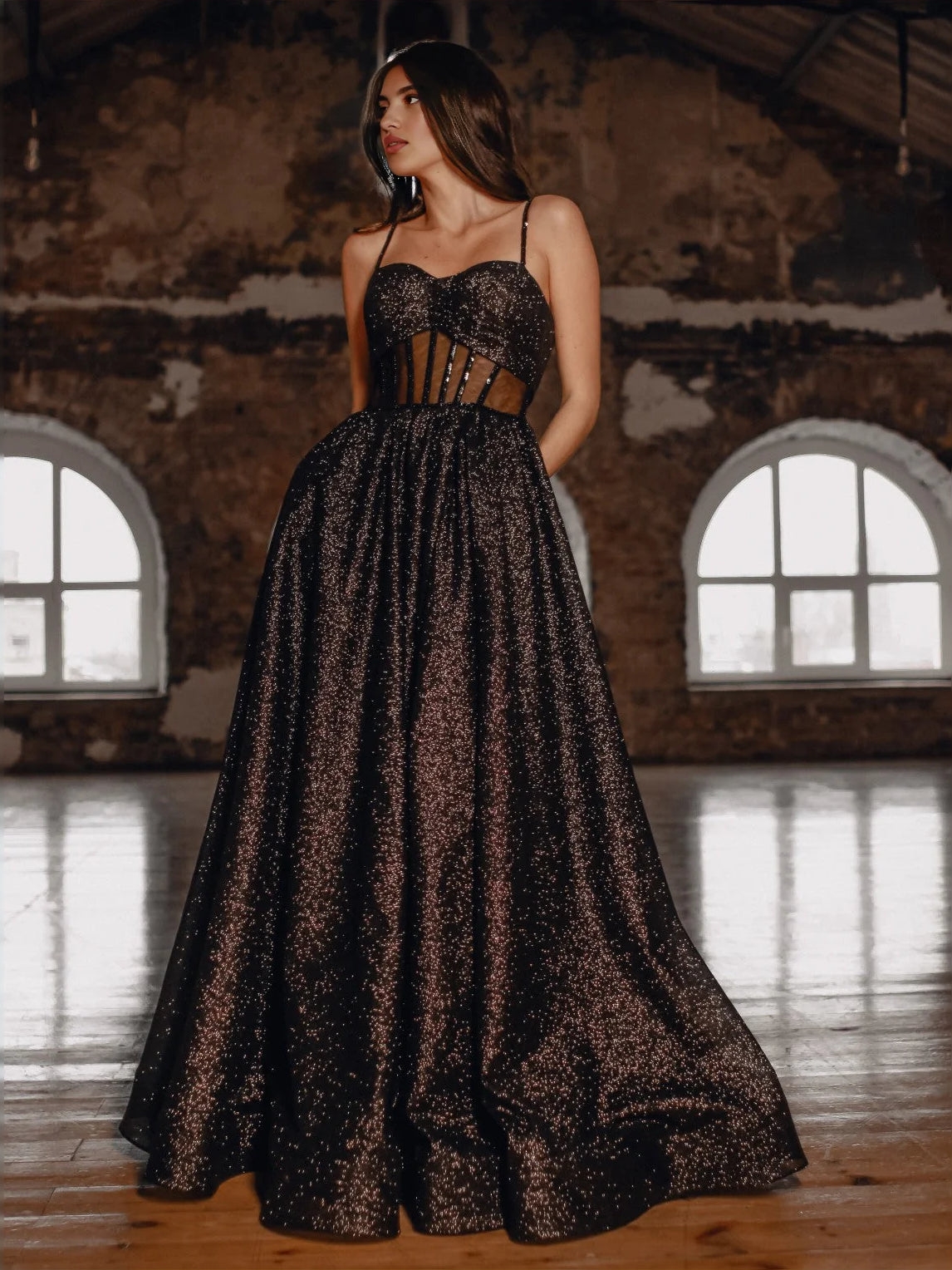 Black glitter corset off-shoulder prom dress with A-line skirt, three-quarter view