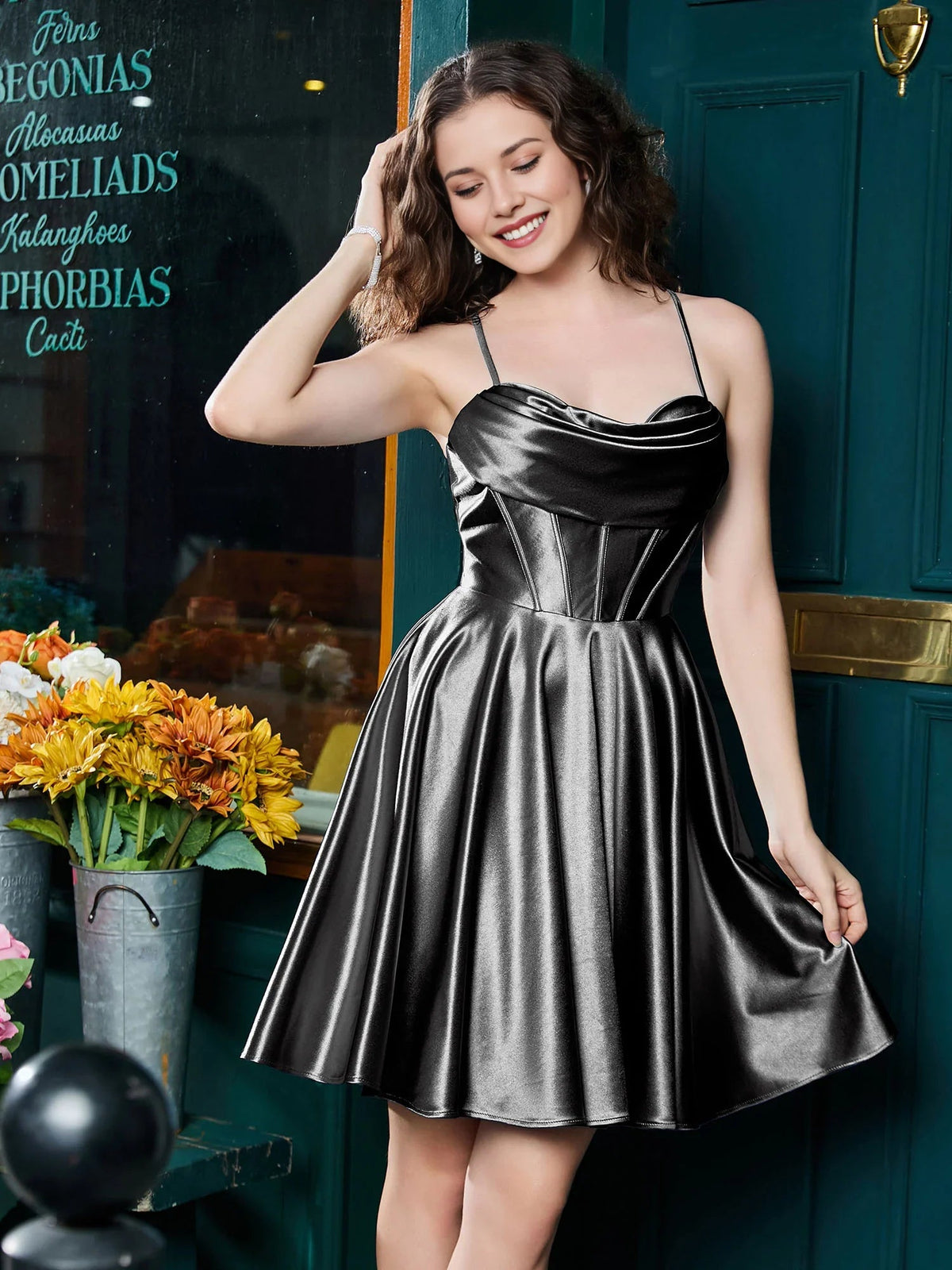 Black satin A-line mini dress with corset bodice, cowl neckline, thin spaghetti straps