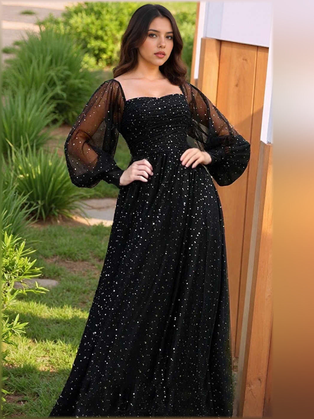 Black square-neck corset formal dress with long sheer sleeves, sparkly bodice