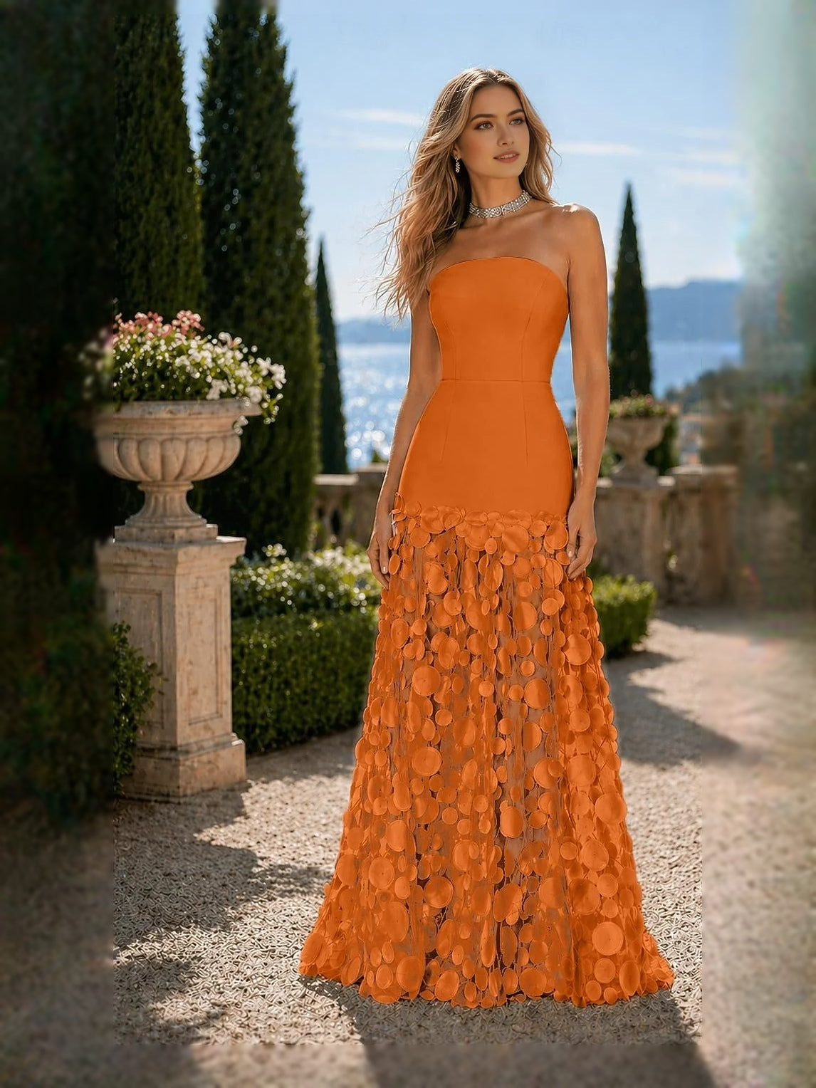 Burnt orange strapless mermaid prom dress with layered tulle skirt, floor-length
