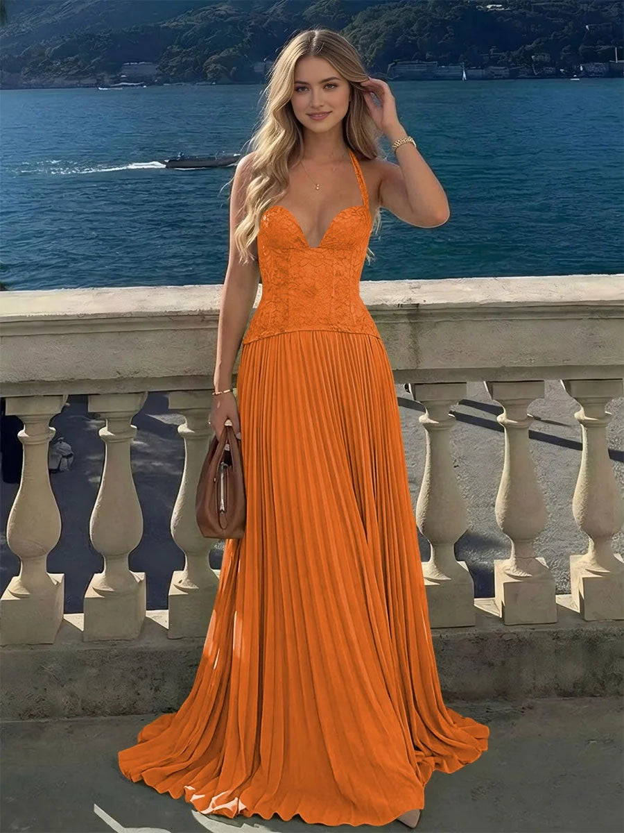 Orange pleated maxi bridesmaid dress with sweetheart corset bodice and A-line skirt