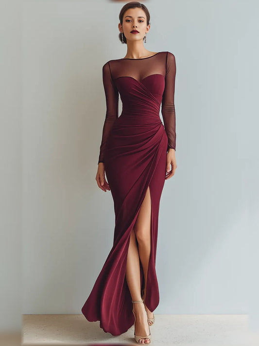 Burgundy sweetheart ruched floor-length formal dress with sheer long sleeves and side slit