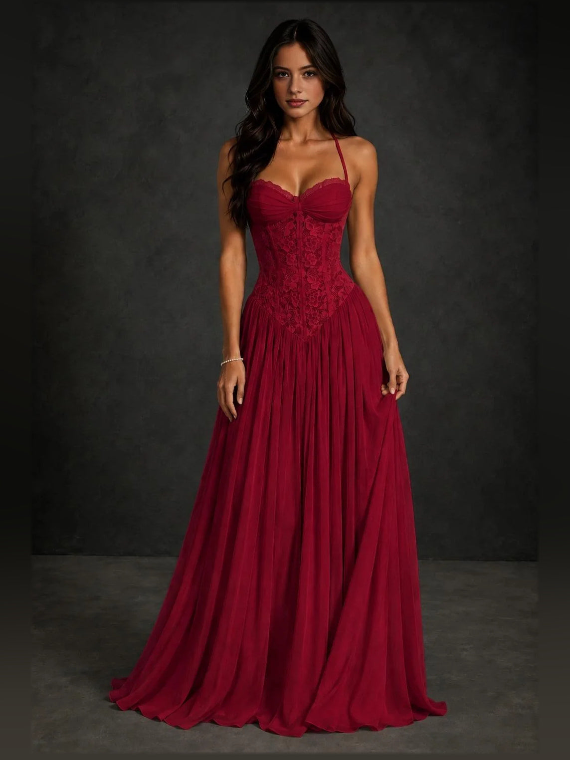 Burgundy A-line prom dress with sweetheart neckline, spaghetti straps, pleated skirt.