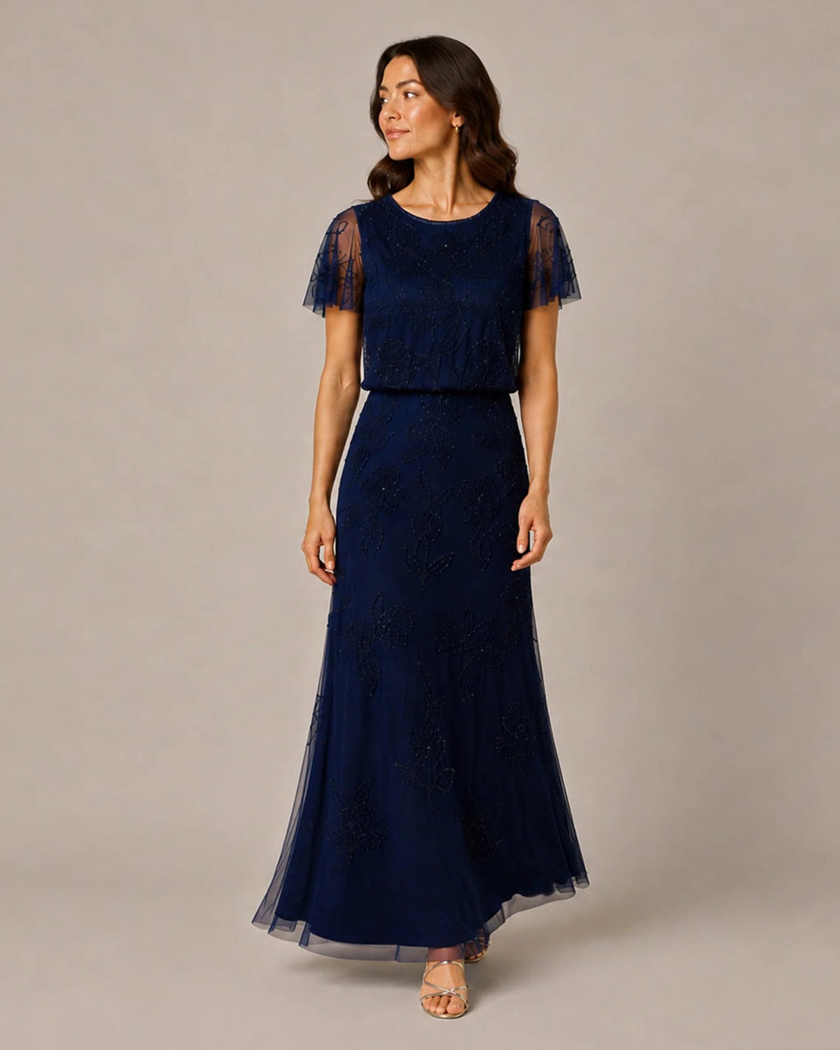Navy floral embroidered A-line maxi dress with sheer sleeves and layered hem