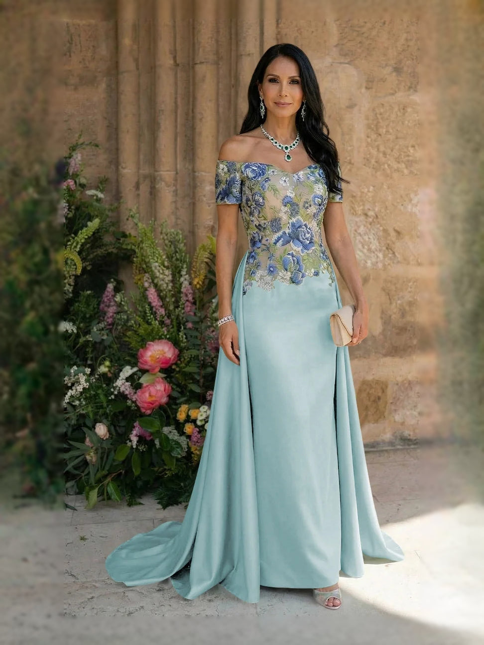 Light blue satin sheath dress with blue embroidered floral sweetheart neckline and drape