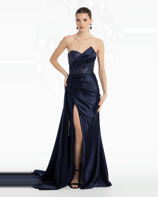 Navy strapless column maxi prom dress with side-slit satin drape and sequin bodice