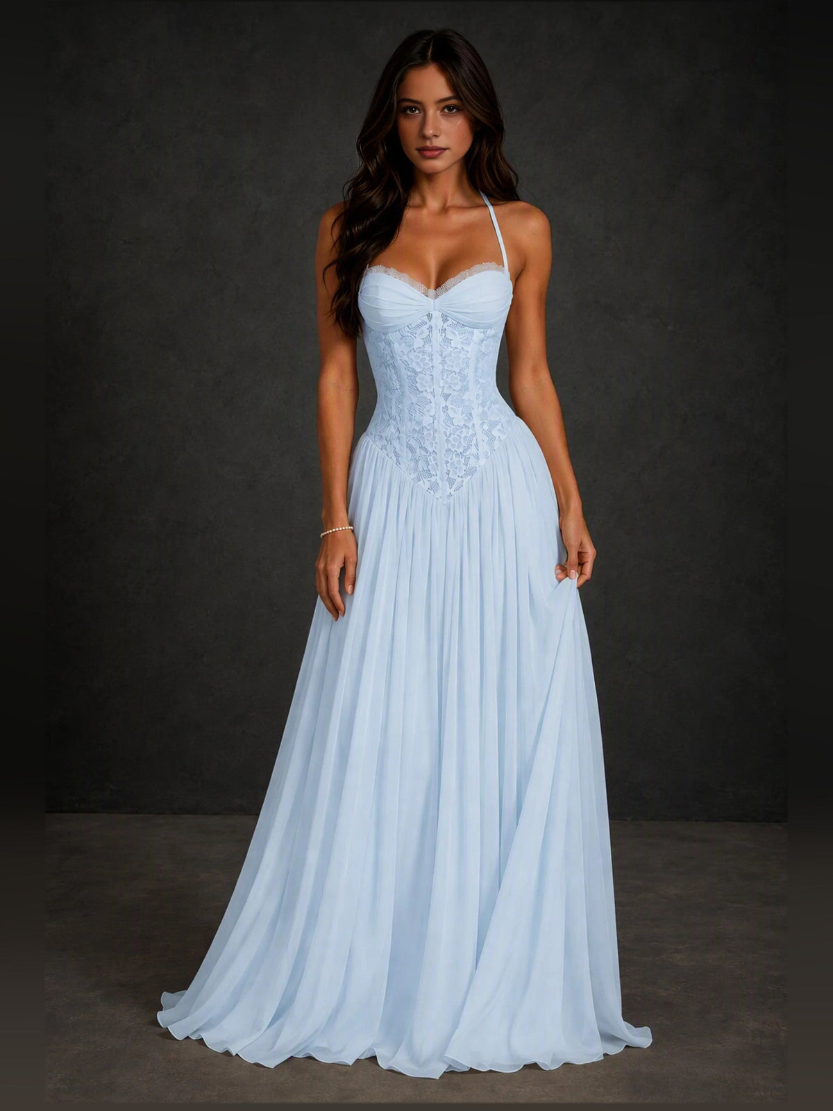 Light blue A-line prom dress with sweetheart neckline, spaghetti straps, pleated skirt.
