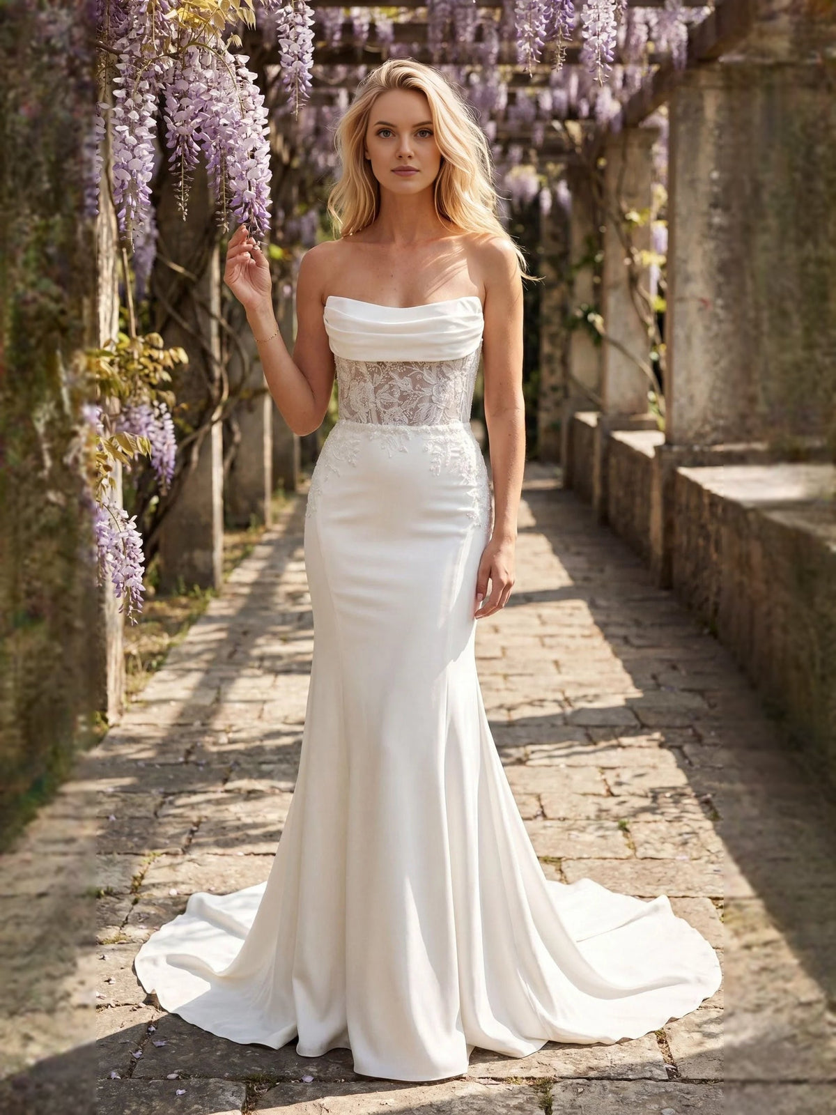 Ivory strapless wedding dress with corset lace bodice and sweeping mermaid train