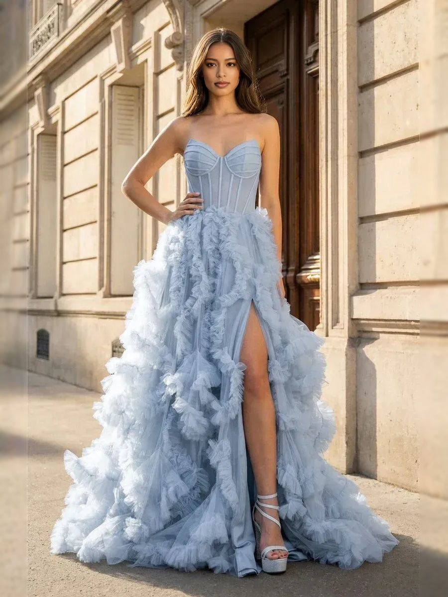 Dusty blue corset prom dress with sweetheart neckline, ruffled tulle skirt and slit