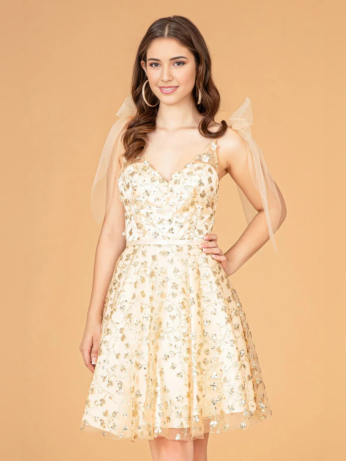 Champagne floral corset mini tulle dress with V-neck, bow straps, and glittery bodice