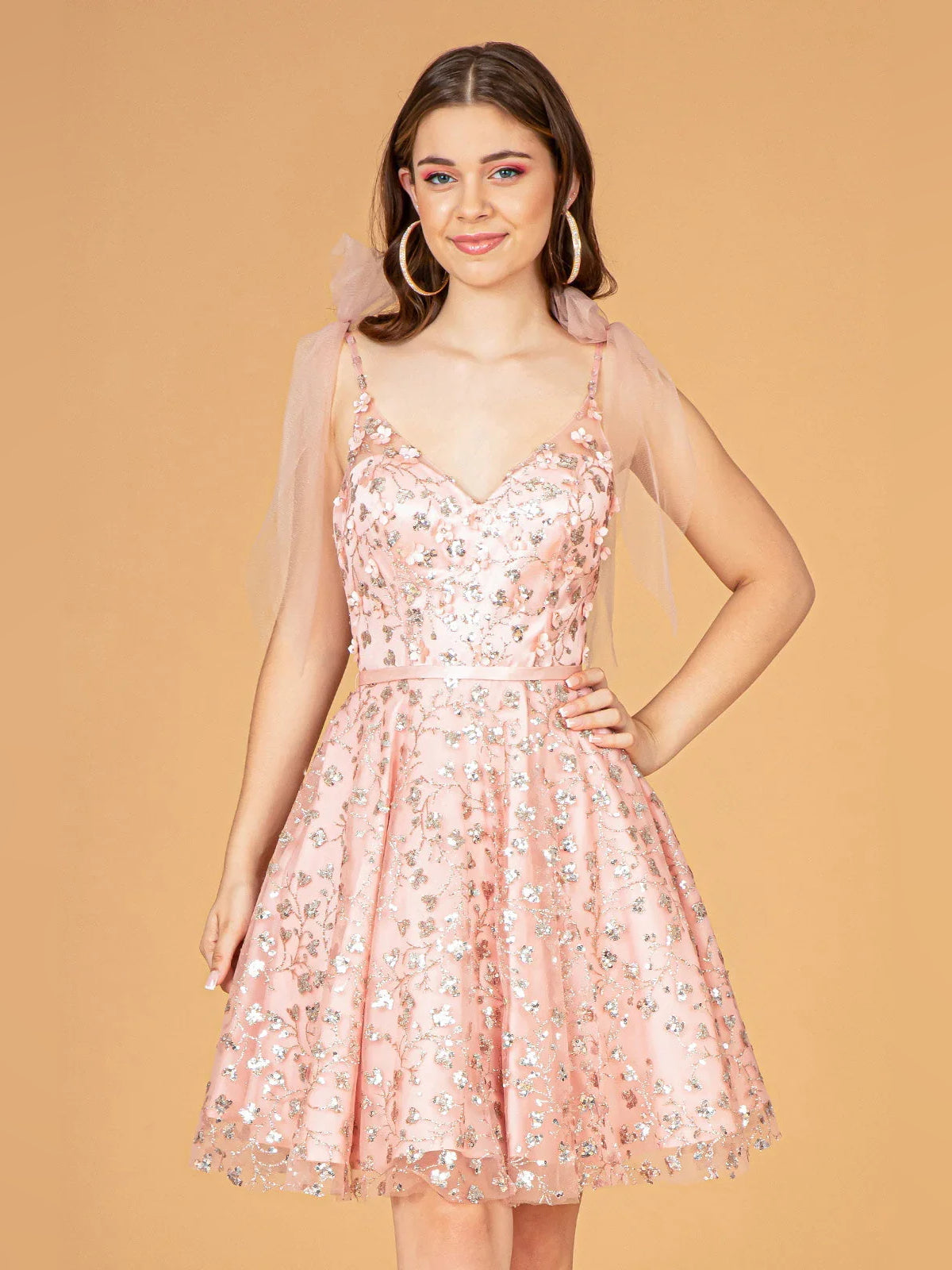 Blush pink sequined V-neck mini dress with tulle bow shoulder straps