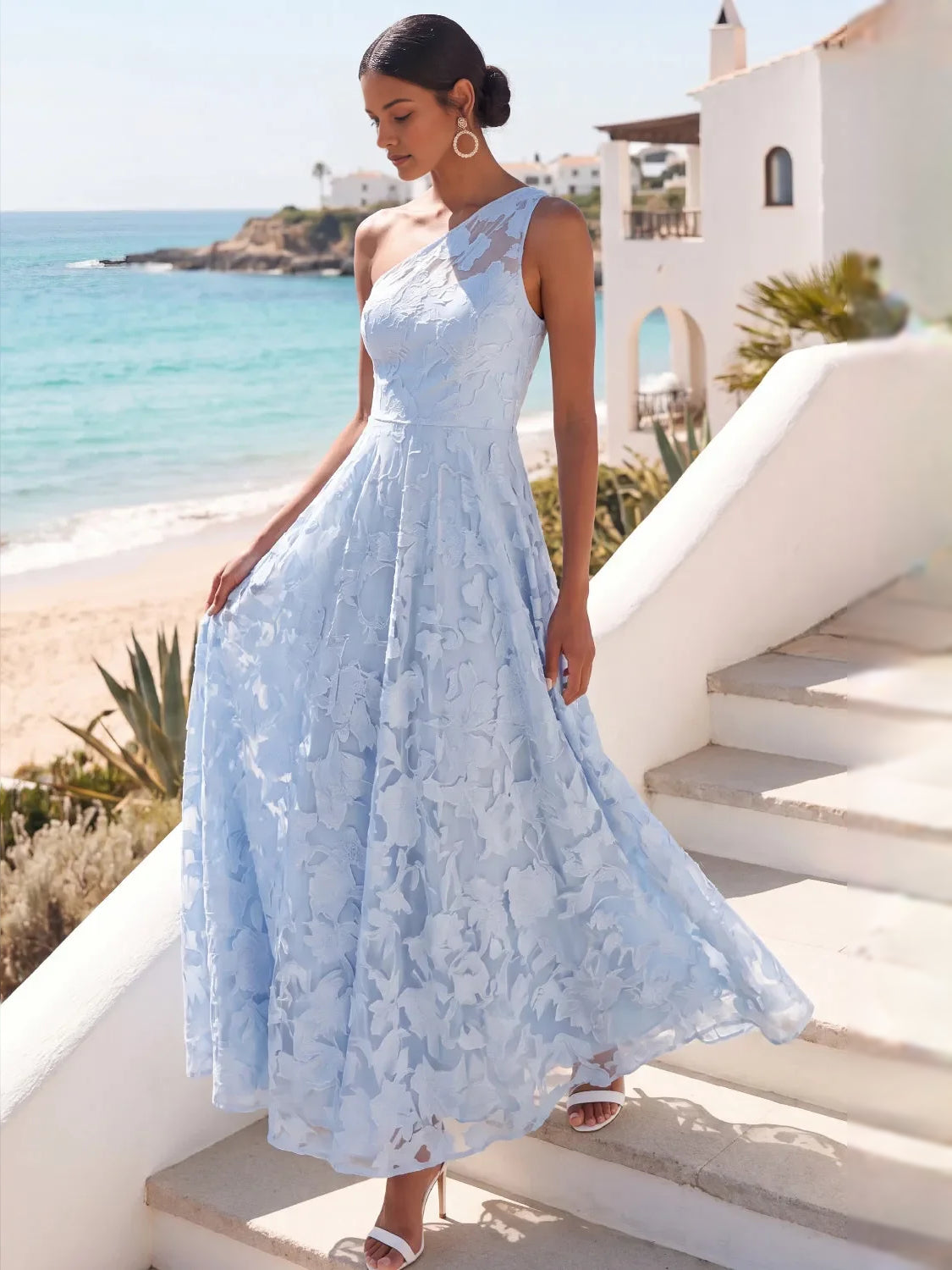Light blue one-shoulder A-line maxi dress with layered floral skirt and asymmetrical neckline