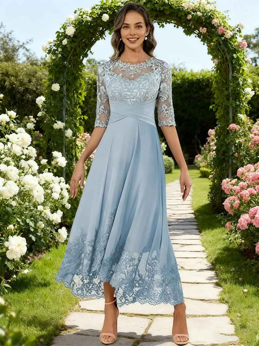 Dusty blue pleated chiffon A-line dress with lace neckline and three-quarter sleeves