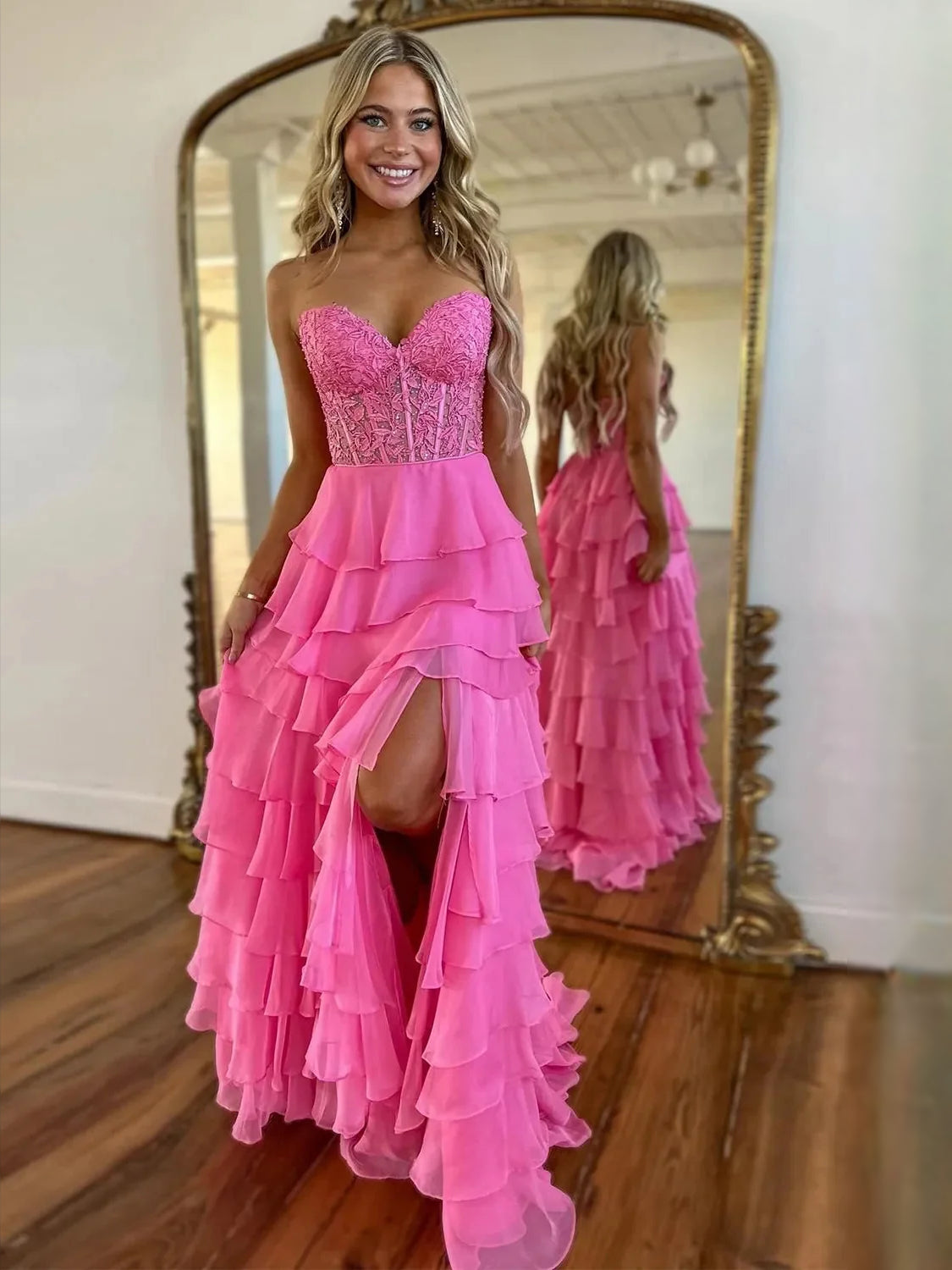 Pink chiffon maxi prom dress with sweetheart bodice, tiered ruffle skirt and side slit