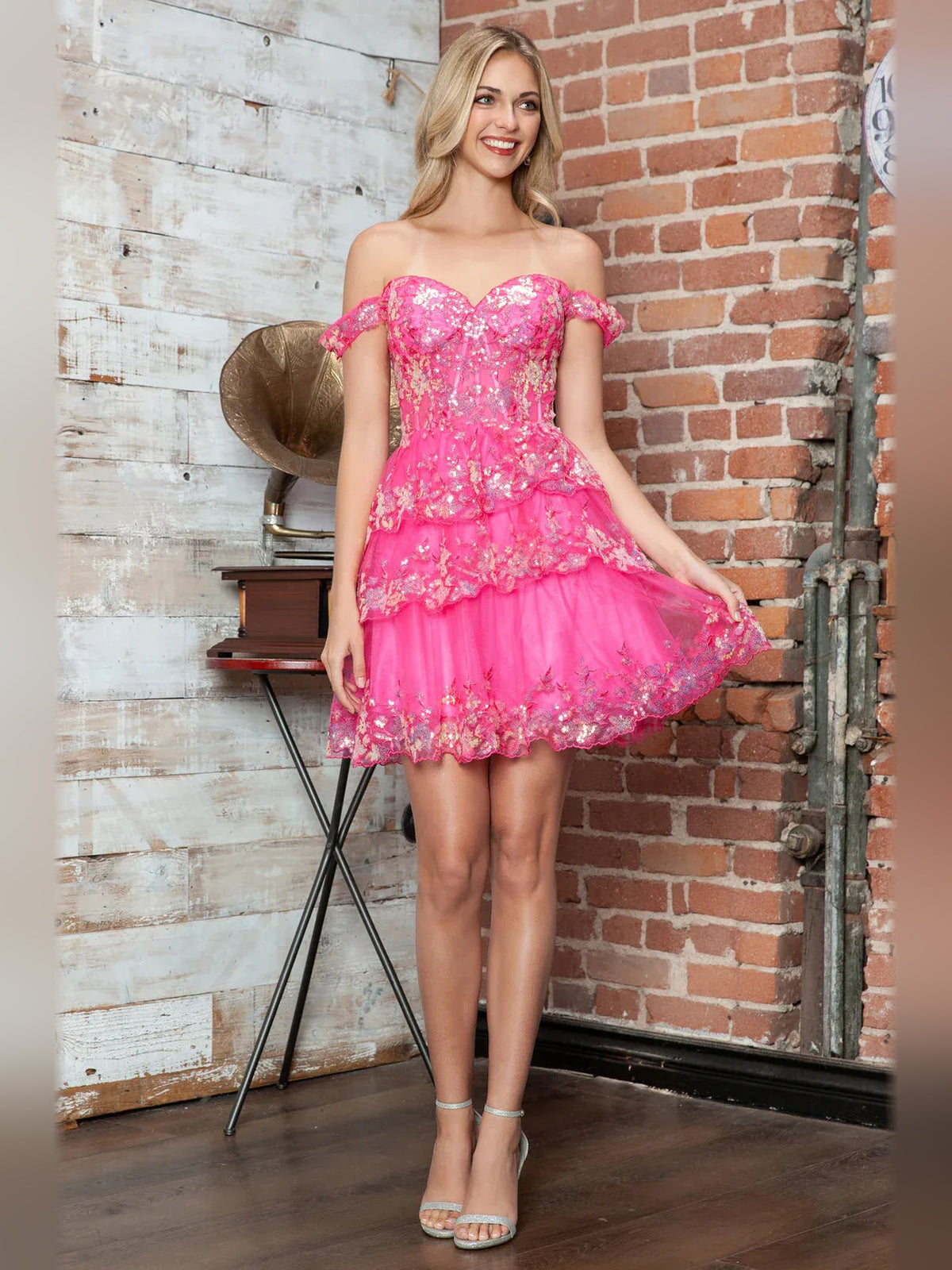 Pink off-shoulder corset-style sweetheart mini tulle dress with floral ruffles