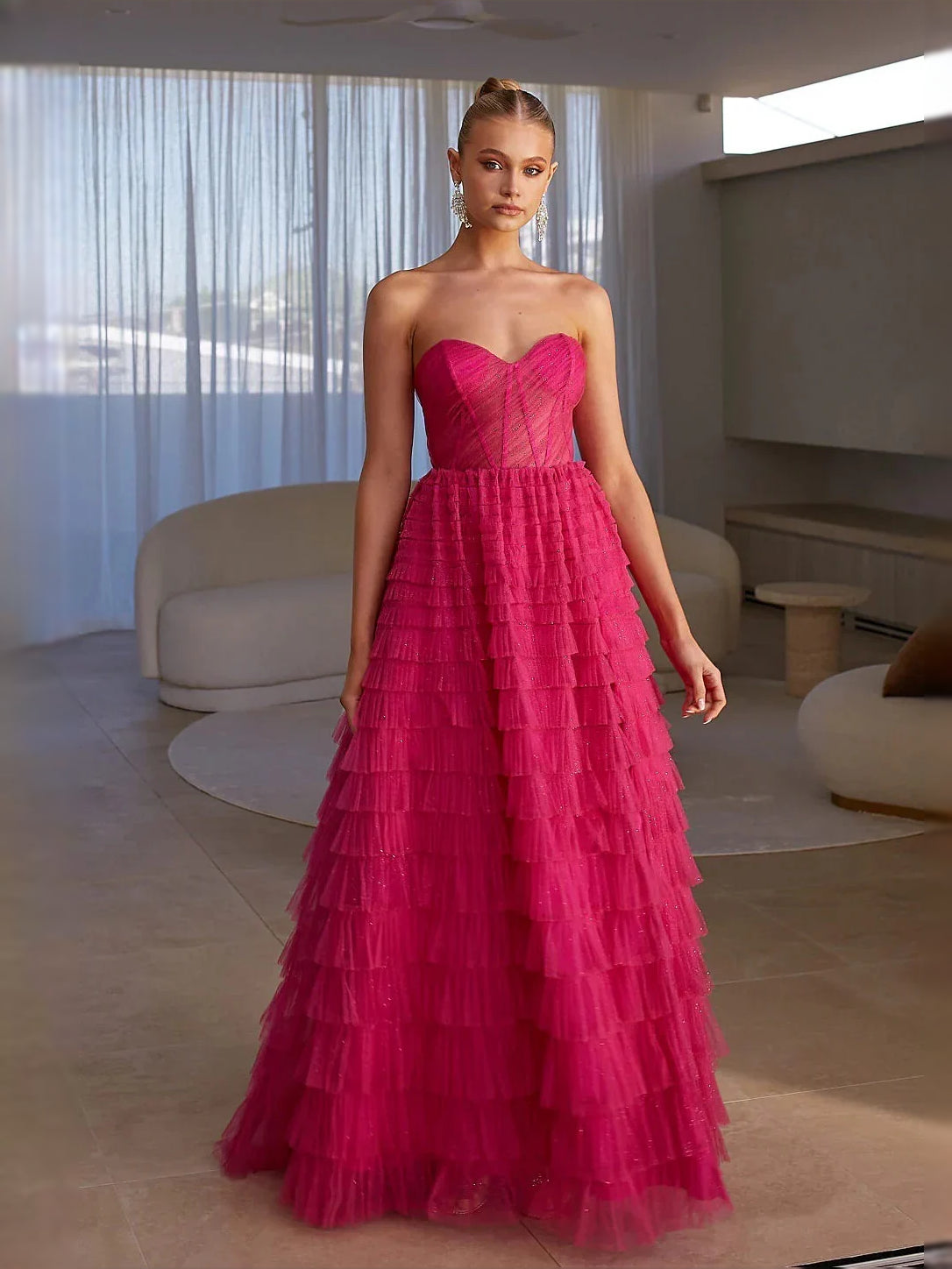 Hot pink strapless sweetheart tiered tulle maxi prom dress with corset bodice