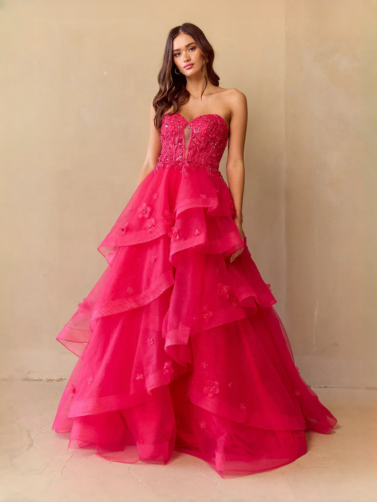 Hot pink sweetheart bodice tiered ruffle tulle prom dress, angled front view