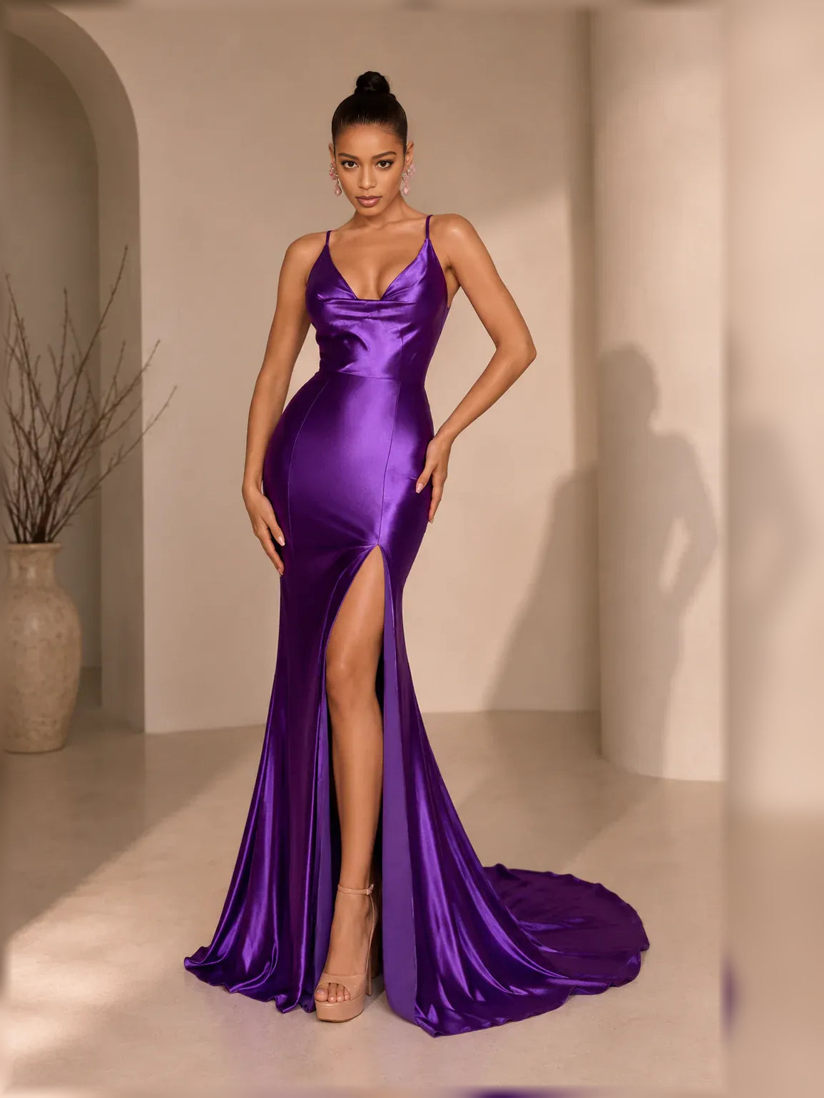 Purple cowl-neck formal dress with spaghetti straps and floor-length slit