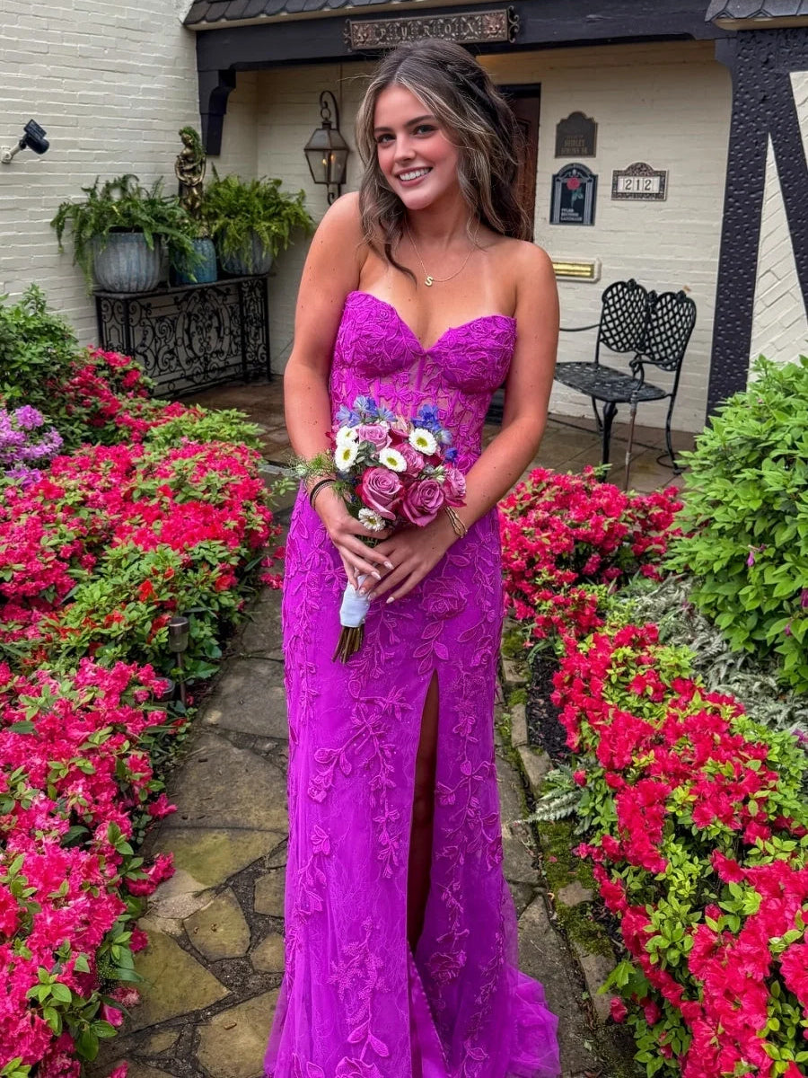 Purple corset prom dress with sweetheart neckline, floral detail, and front slit