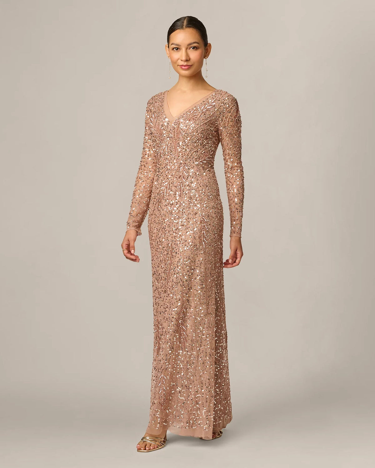 Rose gold sequin long-sleeve A-line maxi dress with V-neckline, full front