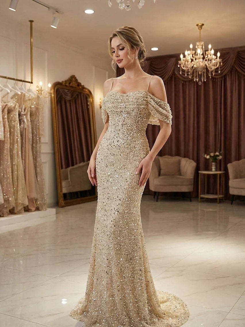 Ivory sequin mermaid prom dress with off-shoulder ruffle neckline, front view