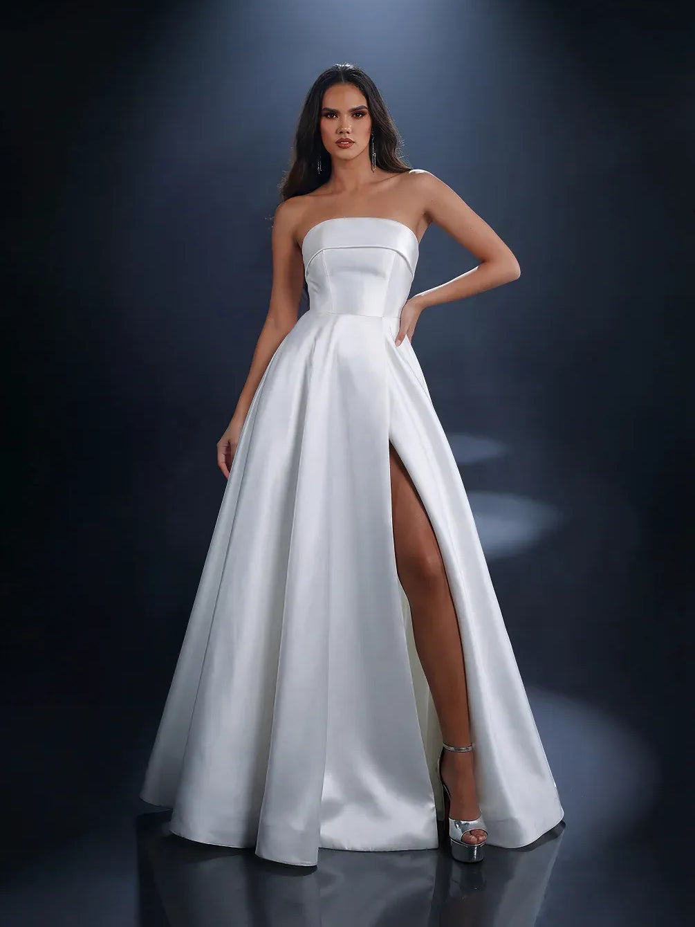 Strapless floor-length white formal dress with side slit and structured bodice