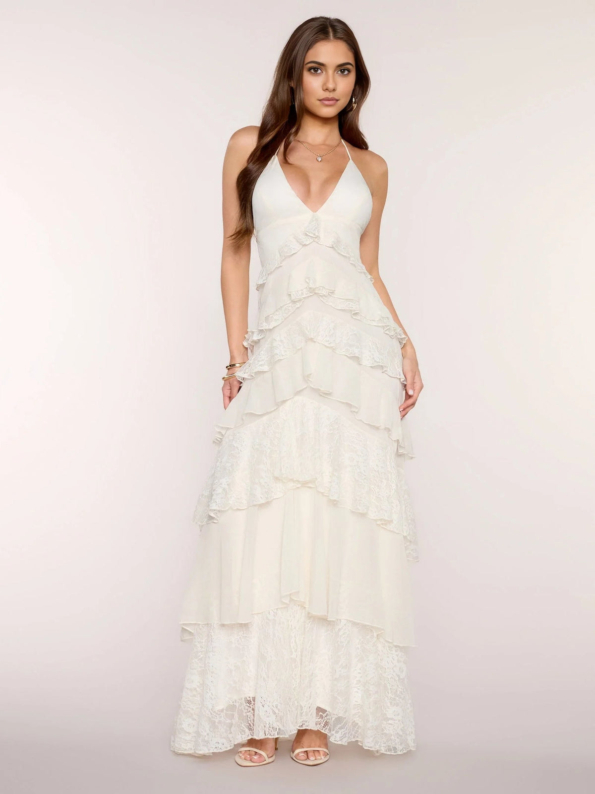 Ivory white tiered ruffle V-neck maxi chiffon prom dress, standing front
